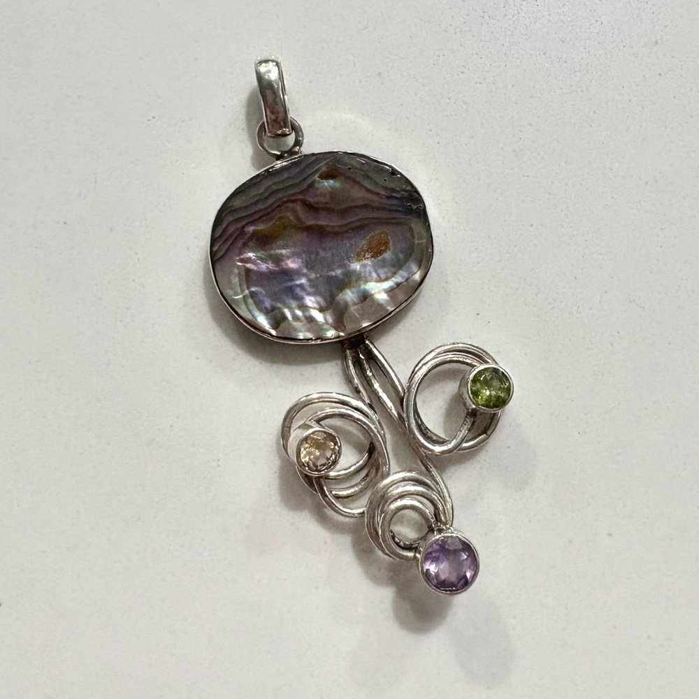 925 Silver Pendant. Genuine abalone shell with round gem stone Accents